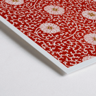 Red floral pattern artwork by Owen Jones from Chinese Ornament. A poster with a red floral pattern titled Examples of Chinese Ornament by Owen Jones featuring intricate white flowers and swirling vines.