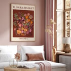 Colorful floral artwork by Moryarty titled Flower Market Chelsea Poster titled Flower Market - Chelsea by Moryarty featuring various colorful flowers on a brown background.