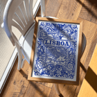 Artistic depiction of Lisbon in blue decorative azulejos by Lisbon Azulejo Blue painted tile 2 Poster featuring intricate blue and white Lisbon cityscape and ornate designs titled Lisbon Azulejo Blue painted tile 2.