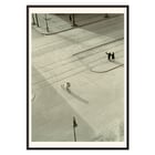 Cyclist on an empty street at dawn captured in artwork 7 AM New Years Morning by László Moholy-Nagy Poster of a black and white city street scene with a cyclist by László Moholy-Nagy titled 7 A.M. New Year’s Morning