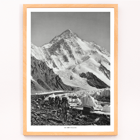 Glacier expedition near K2 by Vittorio Sella Le pic K2 vue prise du glacier Godwin-Austen Poster showing mountaineers trekking toward K2 over a rocky glacier field in black and white by Vittorio Sella titled Le pic K2 vue prise du glacier Godwin-Austen