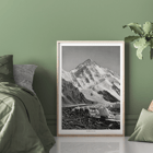 Glacier expedition near K2 by Vittorio Sella Le pic K2 vue prise du glacier Godwin-Austen Poster showing mountaineers trekking toward K2 over a rocky glacier field in black and white by Vittorio Sella titled Le pic K2 vue prise du glacier Godwin-Austen