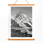Glacier expedition near K2 by Vittorio Sella Le pic K2 vue prise du glacier Godwin-Austen Poster showing mountaineers trekking toward K2 over a rocky glacier field in black and white by Vittorio Sella titled Le pic K2 vue prise du glacier Godwin-Austen