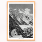 Black and white photograph of Broad Peak by Vittorio Sella featuring snow-covered mountains and climbers in the foreground Poster of snowy Broad Peak mountain captured by Vittorio Sella with mountaineers climbing amidst rocky terrain and glacier