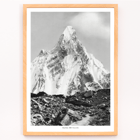 Photograph of Mitre Peak surrounded by rocky terrain by Vittorio Sella Poster of Mitre Peak vu du glacier du Baltoro by Vittorio Sella depicting a towering snowy peak against a rocky foreground.
