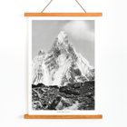 Photograph of Mitre Peak surrounded by rocky terrain by Vittorio Sella Poster of Mitre Peak vu du glacier du Baltoro by Vittorio Sella depicting a towering snowy peak against a rocky foreground.