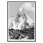 Photograph of Mitre Peak surrounded by rocky terrain by Vittorio Sella Poster of Mitre Peak vu du glacier du Baltoro by Vittorio Sella depicting a towering snowy peak against a rocky foreground.