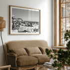 Lisbon Old City landscape black and white by Picture 2 featuring historic architecture and distant sea view Poster featuring a black and white landscape of Lisbon's old city with rooftops and historic buildings titled Lisbon Old City Landscape
