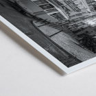 Lisbon Tramway 28 by Black & White Picture showing historic tram in Lisbon street scene Poster featuring Lisbon Tramway 28 Black & White Picture showing the tram navigating through narrow, historic streets with cobblestone pathways.