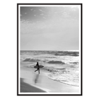 Surfer with a board by the ocean in a black and white picture titled Surfer in Portugal by artist Black Black and white poster Surfer in Portugal by Black & White Picture depicts a lone surfer entering the ocean carrying a surfboard.
