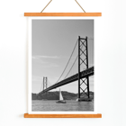 Lisbon Bridge Black and White Picture featuring by Raphael Alves Poster featuring Lisbon Bridge Black & White Picture with a framed photograph of a suspension bridge and a sailboat in the water