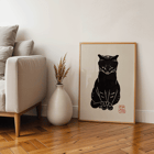 Artwork Black Cat 2 by unknown artist featuring stylized black cat on beige background Poster of a black cat artwork titled Black Cat by Anonymous featuring a bold, minimalist design with a red stamp detail.