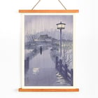 Illustration of a rainy evening at Shinobazu pond by Kasamatsu Shirô showing a person with an umbrella walking near a lamppost. Poster of a serene evening scene with a lone figure by Shinobazu pond Artist Kasamatsu Shirô Artwork Evening rain