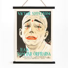 Vintage movie poster of He Who Gets Slapped by Eric Rohman featuring a clown face with red makeup. Poster of He Who Gets Slapped by Eric Rohman featuring a sad clown face with dramatic makeup and bold text in Swedish.
