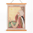 Woman in colorful attire reaching for the sun Vogue by George Plank Art Deco Vogue poster illustrating a woman gazing at the sun in vibrant attire by George Plank titled Vogue by George Plank