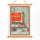 Drink Coca Cola vintage advertisement depicting a busy street scene Poster titled Drink Coca Cola showing a bustling street scene with people near a pharmacy and a large Coca Cola billboard