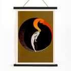 Le Gaulois artistique features an abstract design with vibrant colors. Le Gaulois artistique poster features abstract figure with fiery hair inside a dark circular frame with golden background.