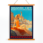 Atlantic City beach scene by Edward M Eggleston Poster titled Atlantic City Pennsylvania Railroad by Edward M Eggleston showing a woman in an orange swimsuit at a beach resort
