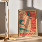 Art Nouveau poster featuring a woman drawing by Emile Berchmans titled L'Art Independant. Poster of a woman drawing with text advertising various art forms L'Art Independant by Emile Berchmans Paris location included