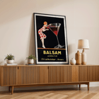 Balsam Aperitif by Jean d'Ylen featuring a woman sipping from a giant cocktail glass. Poster of Balsam Aperitif by Jean d'Ylen featuring a woman sipping from a giant glass with vibrant red contents.