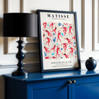 Matisse Dancing Figures Exhibition Poster featuring red cut-out figures on a patterned background with exhibition details.