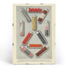 Lilly Pills by Eli Lilly & Company features various colorful pill samples in glass vials. Poster of various pill samples in glass vials Lilly Pills by Eli Lilly & Company displaying shapes sizes and coatings.