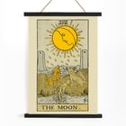 The Moon tarot card featuring sun and animals from The Illustrated Key to the Tarot by Lauron William de Laurence Poster of The Moon by Lauron William de Laurence featuring a tarot card with dogs howling at a moon with a face.