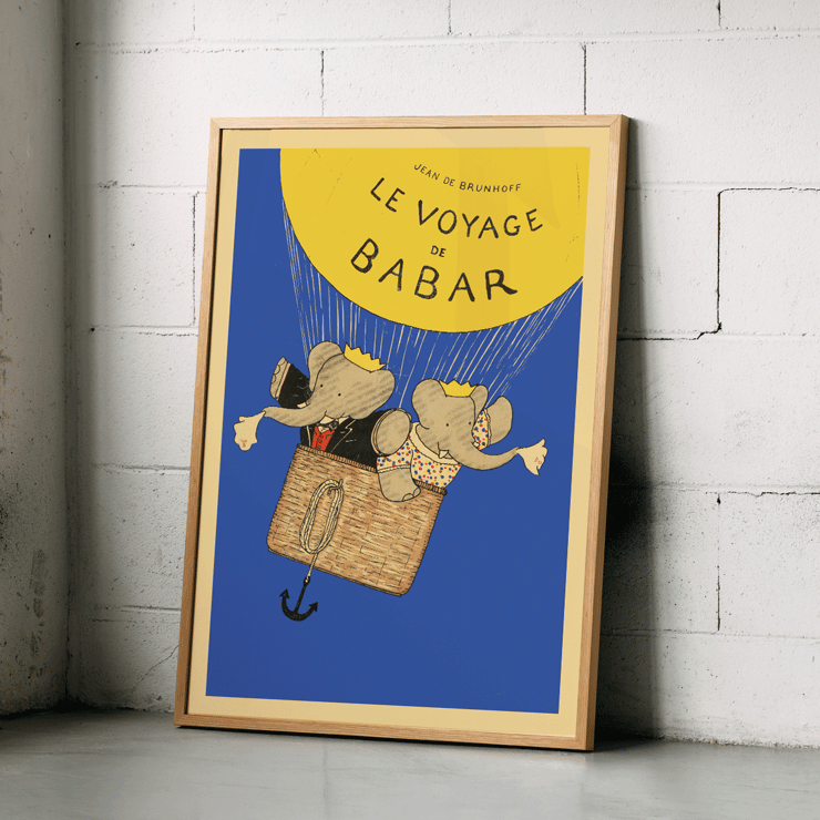 Poster of Le Voyage de Babar by Jean de Brunhoff featuring elephants in a basket under a yellow balloon on a blue background.