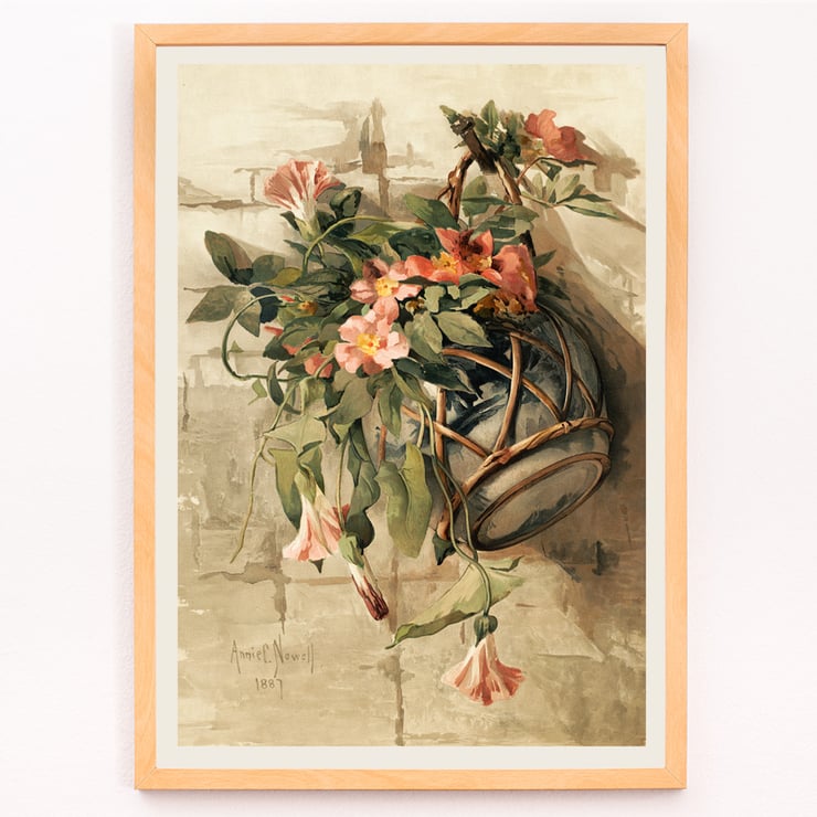Fleurs roses dans un vase suspendu Fleurs roses dans un vase suspendu