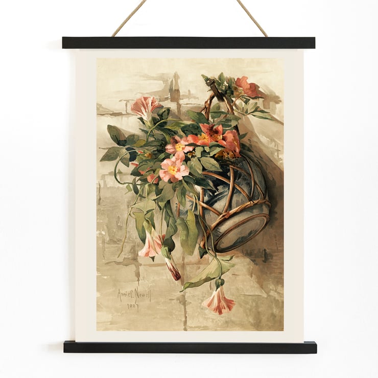 Fleurs roses dans un vase suspendu Fleurs roses dans un vase suspendu