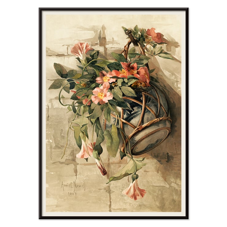 Fleurs roses dans un vase suspendu Fleurs roses dans un vase suspendu