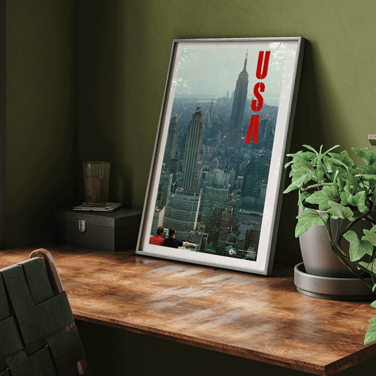 Skyline view of New York with bold USA letters in artwork by U.S. Information Agency USA New York Department of Commerce Poster titled New York by U.S. Information Agency depicting a cityscape view with skyscrapers and large red letters USA.