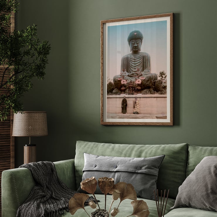 Large Buddha by Kinbei Kusakabe featuring a serene statue with two people standing in front. Poster of Large Buddha with two people in front by artist Kinbei Kusakabe featuring a serene statue surrounded by flowers.