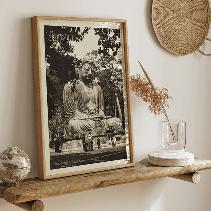 Great Buddha Kamakura by Japanese Government Railways depicting a large Buddha statue and people in Japan Japan travel poster depicting the Great Buddha in Kamakura by Japanese Government Railways with people near the statue.