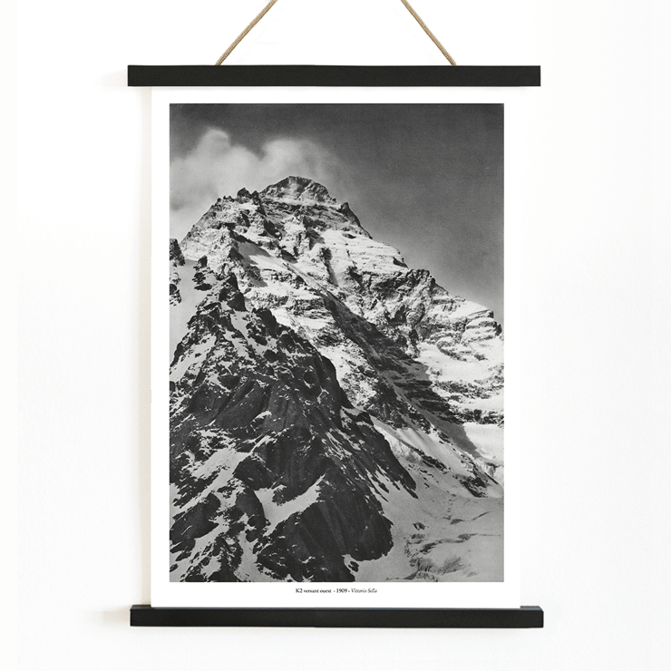 Black and white photograph of K2 western slope by Vittorio Sella Poster of the west face of K2 by Vittorio Sella showing the snow-covered mountain peak in black and white photography.