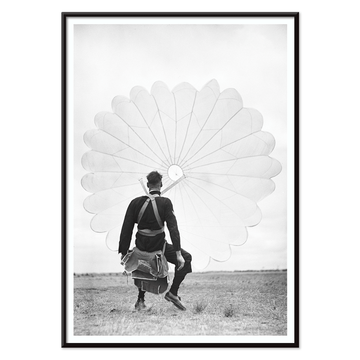 Air force parachuter landing by Ray Olsen Poster of an air force parachuter standing on ground with deployed parachute by Ray Olsen titled Air force parachuter