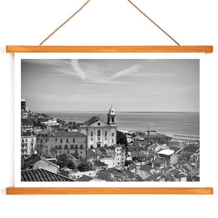 Lisbon Old City Landscape by Black & White Picture 1 depicts historic buildings rooftops and ocean view Poster featuring Lisbon Old City Landscape Black & White Picture 1 with a view of historical buildings and waterfront.