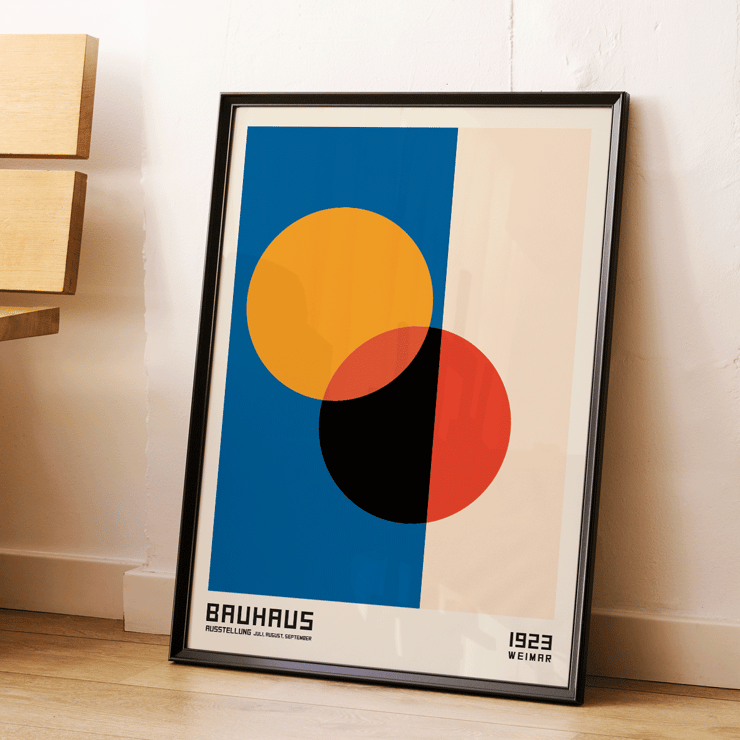 Bauhaus Poster 17 features intersecting circles in orange red black on blue and beige background framed with text at the bottom