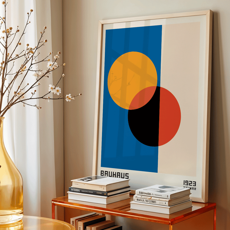 Bauhaus Poster 17 features intersecting circles in orange red black on blue and beige background framed with text at the bottom