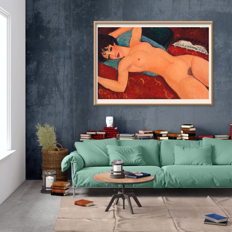 Nu couché by Amedeo Modigliani features a reclining nude woman on a red background Poster of Nu couché by Amedeo Modigliani depicting a reclining nude figure on a colorful background.