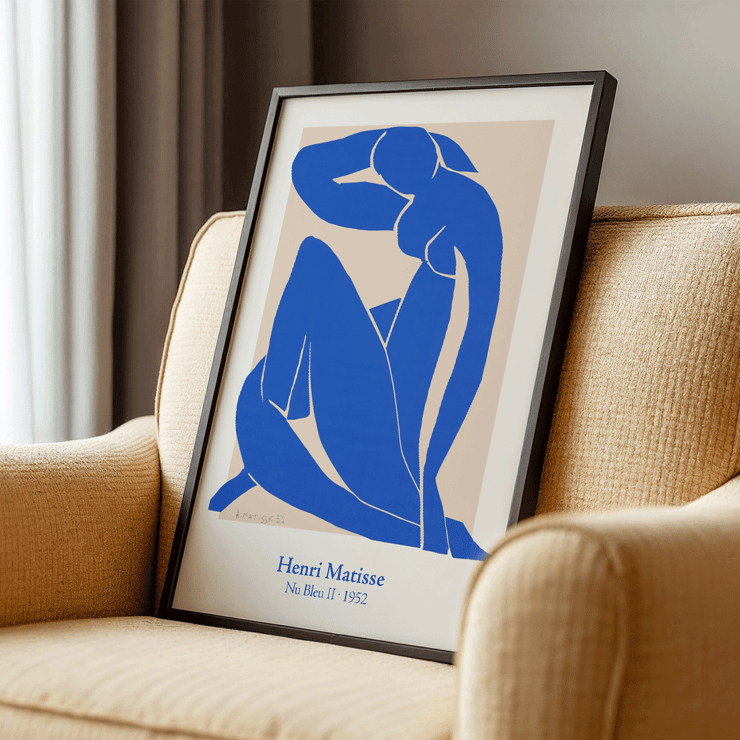 Nu Bleu II by Henri Matisse abstract blue figure art print framed Poster featuring the artwork Nu Bleu II by Henri Matisse with a blue abstract figure on a beige background.