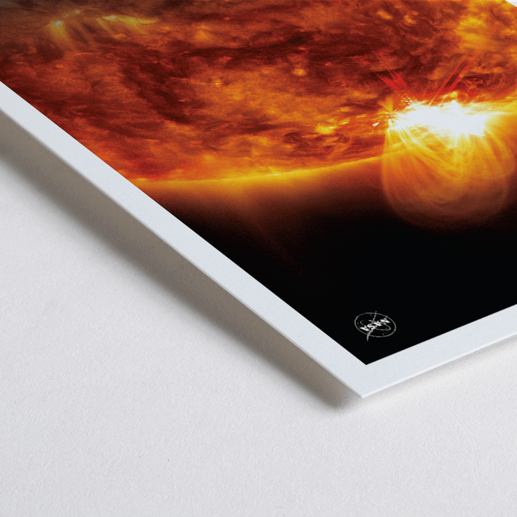 A fiery depiction of the Sun by NASA in The Sun 1 artwork. Poster featuring a vibrant image of the sun with solar flares and the title The Sun by NASA.