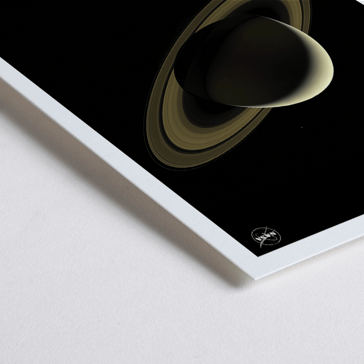 Illustration of planet Saturn by NASA. Poster of the artwork Saturn by NASA featuring the planet Saturn with its rings against a black background.