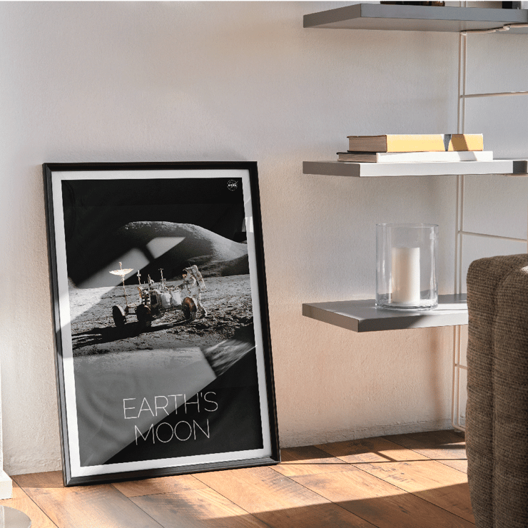 Astronaut with lunar rover on the moon surface Man on Moon 1 by NASA A poster titled Man on Moon 1 by NASA depicting an astronaut beside a lunar rover on a moon surface with Earth's Moon text.