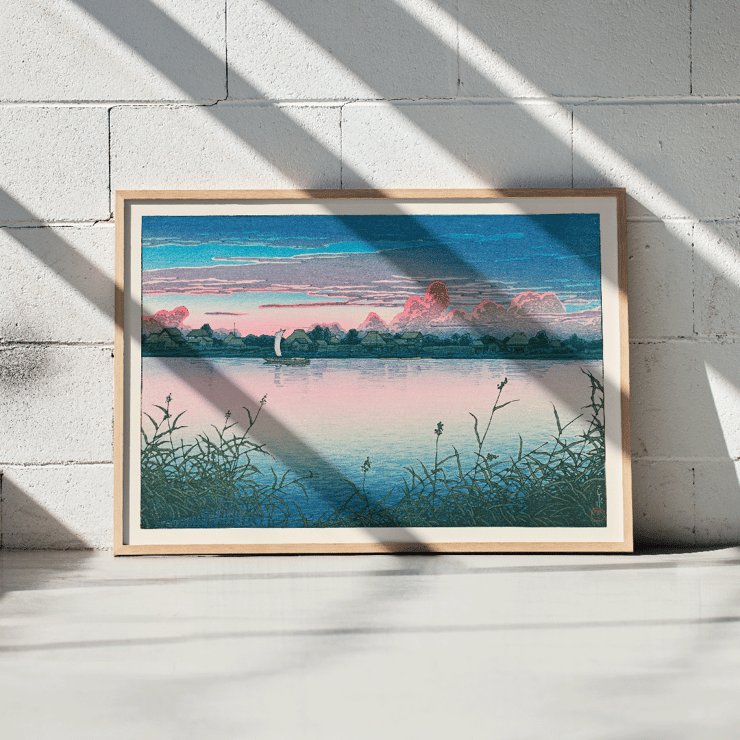Peaceful twilight at a lakeside village Early Autumn in Urayasu by Kawase Hasui Poster of Early Autumn in Urayasu by Kawase Hasui depicting a serene waterfront scene with houses, a boat, and a colorful sky.