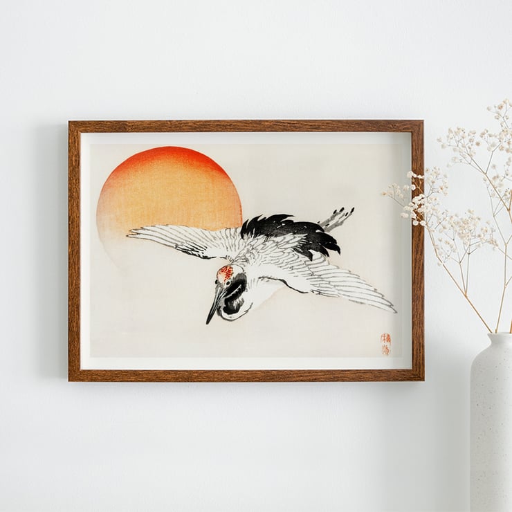 Flying crane in front of an orange sun by Kōno Bairei Poster of a crane flying with a red sun in the background titled Flying crane by Kōno Bairei.