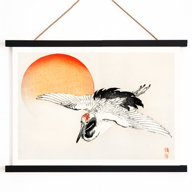 Flying crane in front of an orange sun by Kōno Bairei Poster of a crane flying with a red sun in the background titled Flying crane by Kōno Bairei.
