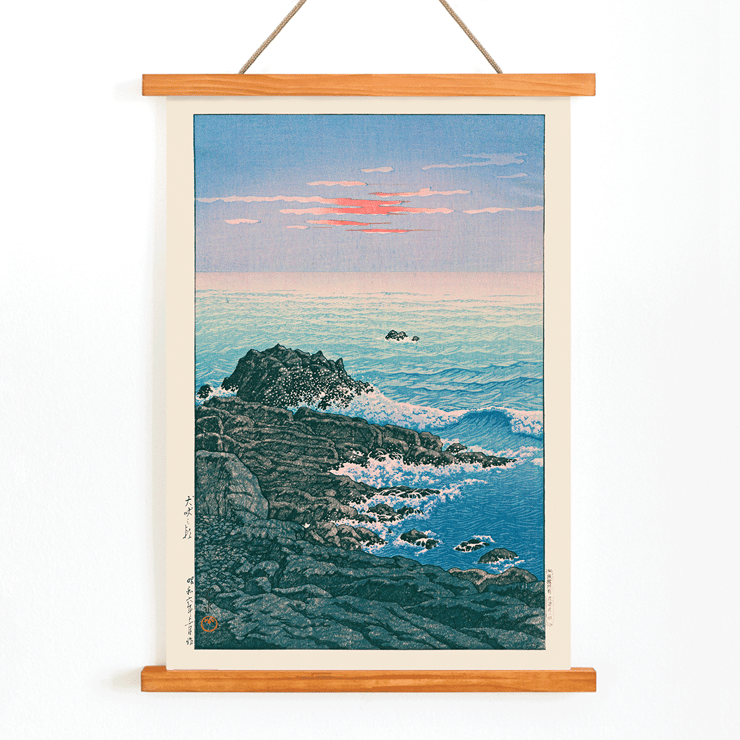 Seascape at dawn by Kawase Hasui Morning at Cape Inubō Poster of a coastal scene with waves crashing on rocky shore at sunrise titled Morning at Cape Inubo by Kawase Hasui.