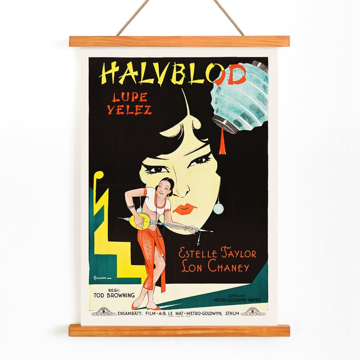 Poster artwork for Halvblod by Eric Rohman Where East is East featuring Lupe Velez Estelle Taylor and Lon Chaney Poster for film with Lupe Velez playing a string instrument and an illustration by Eric Rohman for Where East is East.