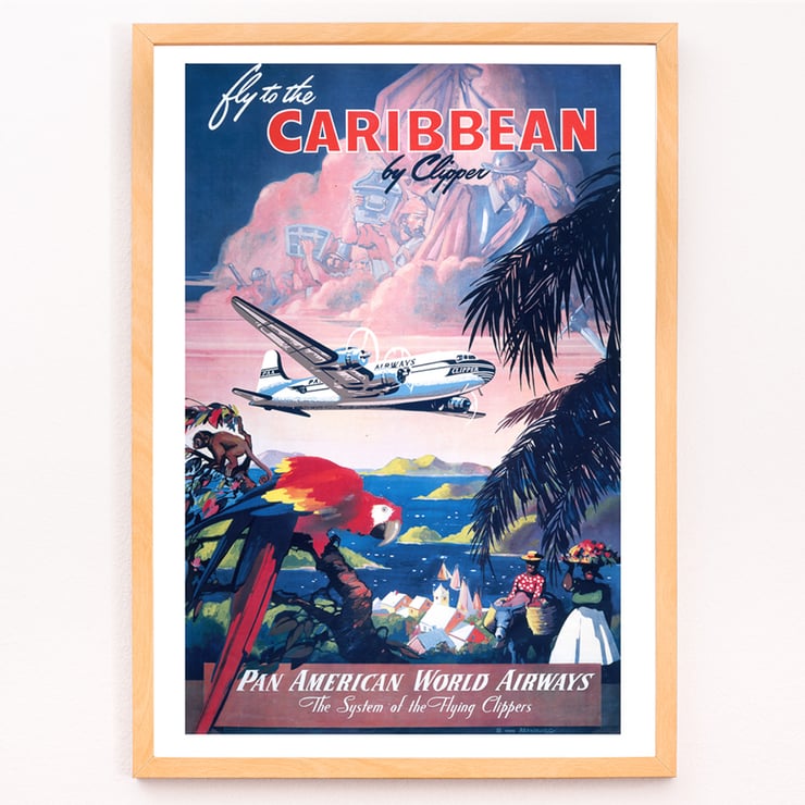 Fly to the Caribbean by Clipper artwork by Mark Von Arenburg depicting Pan American World Airways plane. Poster of Pan American World Airways promoting Caribbean flights by clipper showcasing vibrant tropical scenery by Mark Von Arenburg.